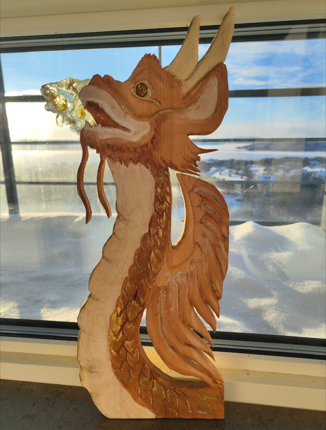 Florenz the dragon breathing a stream of light